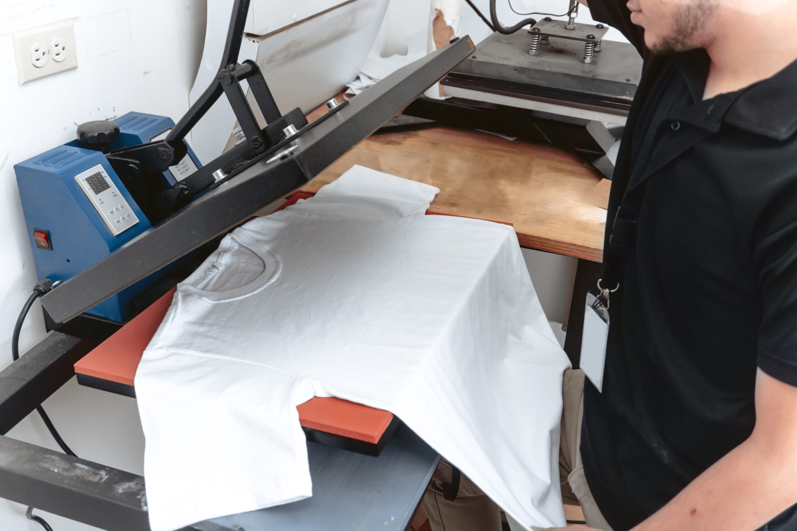 A,Unrecognizable,Person,Working,On,A,Iron,Sublimation.,Printing,Concept